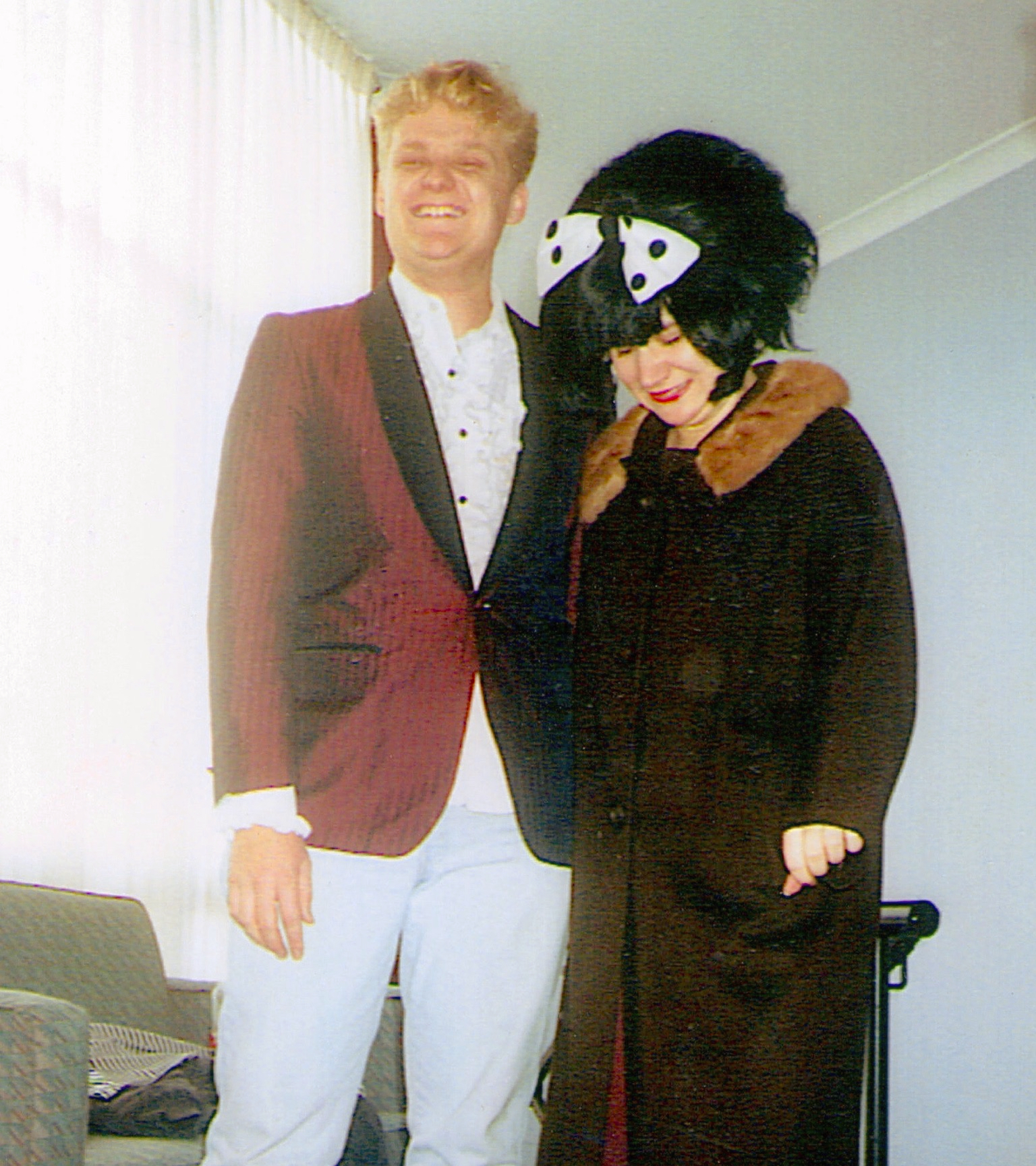 A smiling young Todd, cosplaying as Jon Pertwee, accompanied by a friend dressed as Barbara