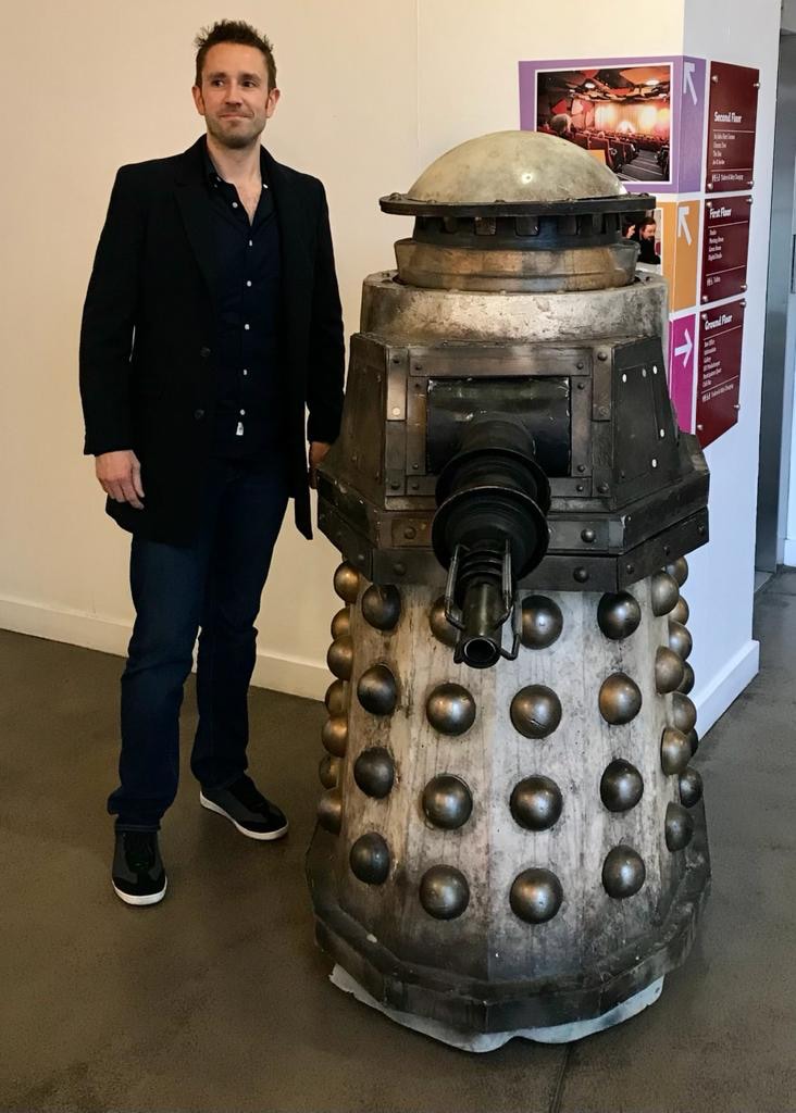 Mark dressed in black and standing next to the Special Weapons Dalek from  Remembrance of the Daleks