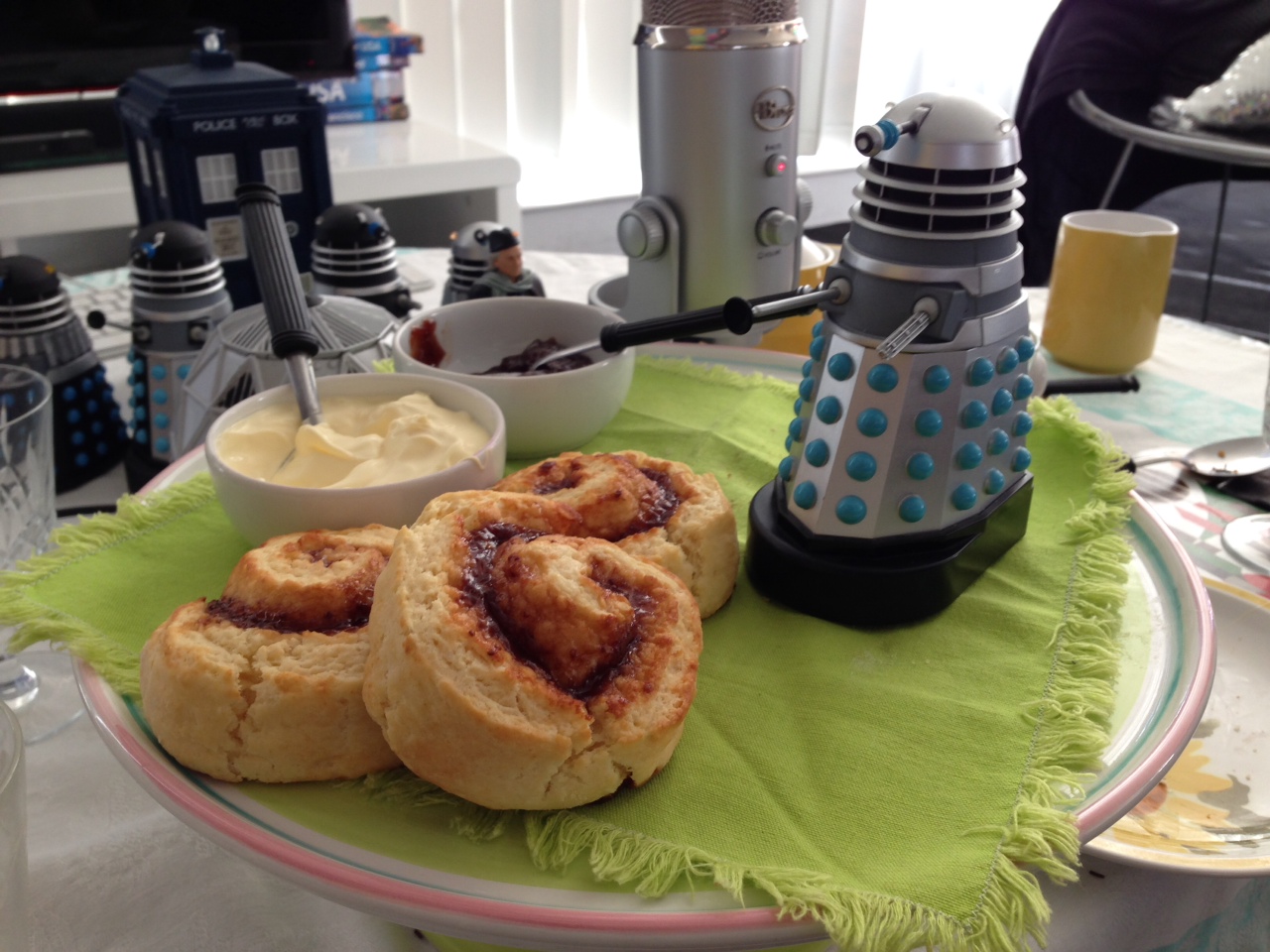 Some optera larvae scrolls being menaced by a toy Dalek